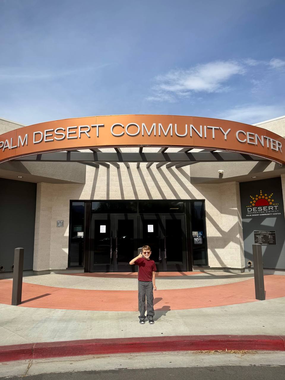 Keith giving a thumbs-up in front of the Palm Desert Community Center, where the new chess club meets.